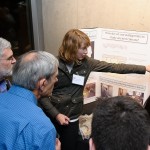 Graduate student Elena Steponaitis describes how her lab studies paleo-climate from minerals. Credit: John Gillooly