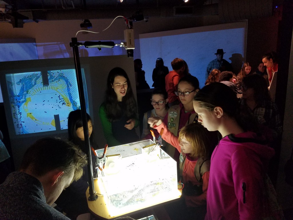 Graduate student Mara Freilich shows Girls Day attendees how plastics and debris become trapped in a gyre. (Photo: Lauren Hinkel)